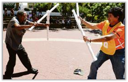 : Players
participating in the Indigenous Games Festival — Intonga
Game