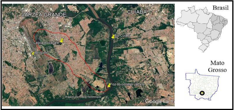 Localização da área da microbacia do córrego Jacaré na cidade de Várzea Grande
(delimitada pela linha vermelha) e do rio
Cuiabá, que marca o limite entre os municípios de Cuiabá e Várzea Grande (MT) 