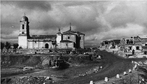GENERAL VIEW OF
BRUNETE WITH THE RUINS REMOVED, THE CHURCH WITHOUT REBUILDING AND THE
CONSTRUCTION OF THE FIRST HOUSES, 1940.