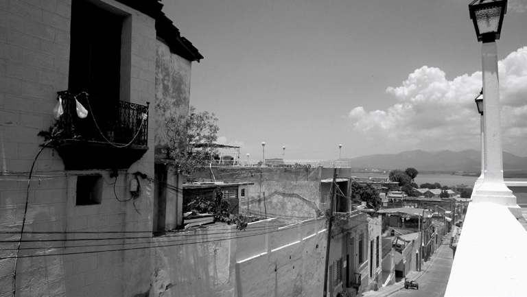 AN INCLINED STREET SEEN FROM THE VELÁZQUEZ BALCONY, SANTIAGO DE CUBA.