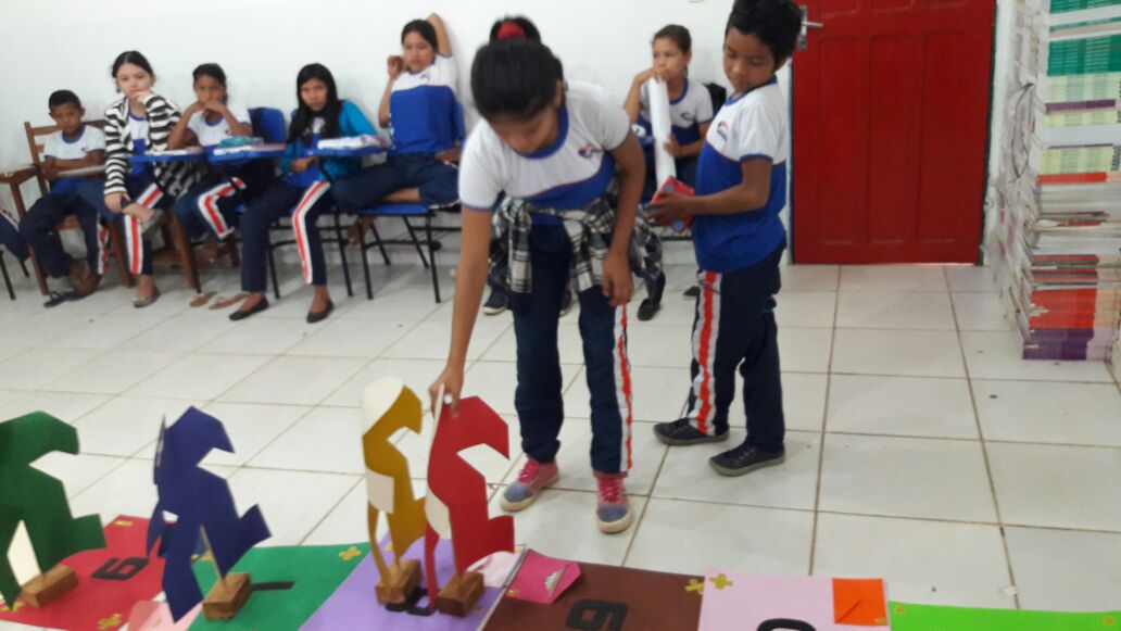 Oficina do jogo da trilha das quatro operações matemáticas.