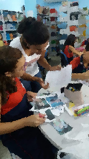 Prática pedagógica da pibidiana Ana com os alunos do 6º ano, na Escola Raio de Sol