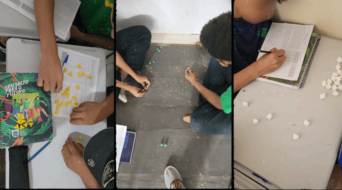 Estudantes desenvolvendo a atividade com poliedros simulando o fenômeno probabilístico de átomos instáveis.
